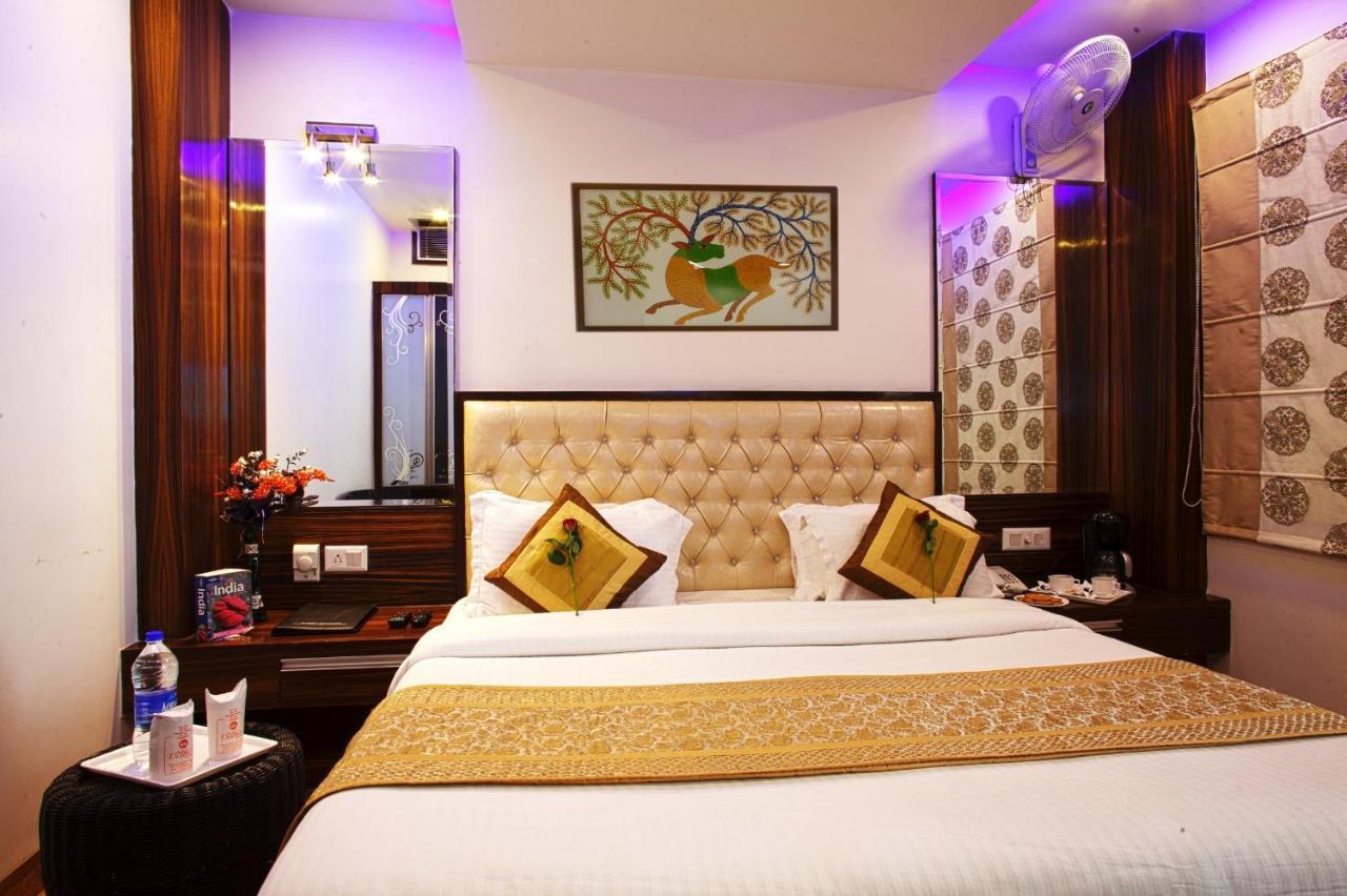 Hotel Delhi 55 -City Center New Delhi Værelse billede