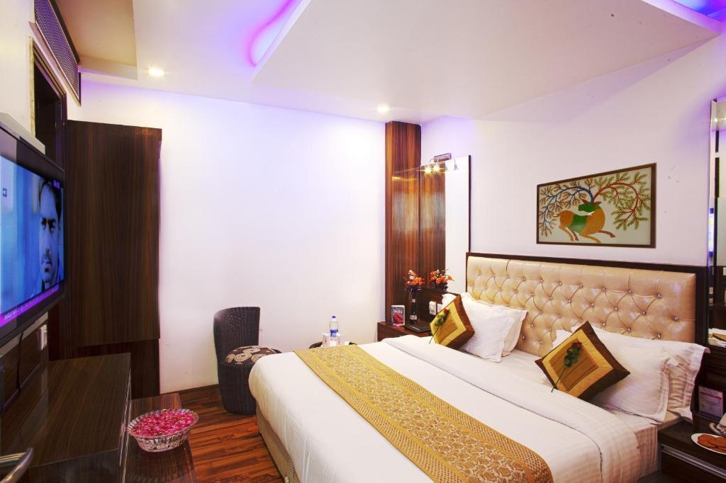 Hotel Delhi 55 -City Center New Delhi Værelse billede