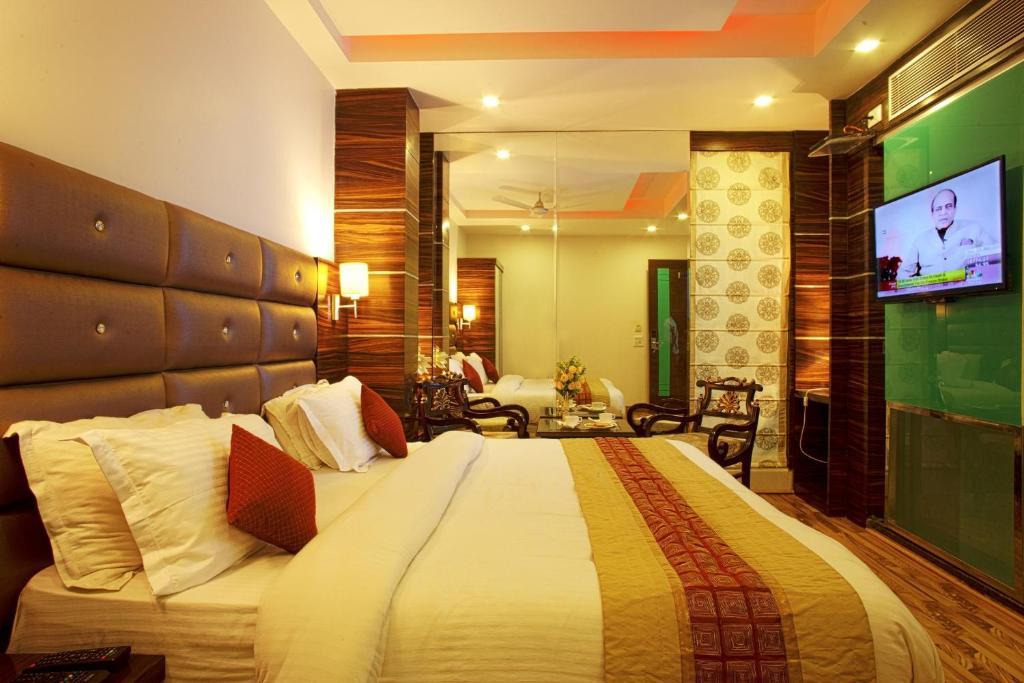 Hotel Delhi 55 -City Center New Delhi Værelse billede