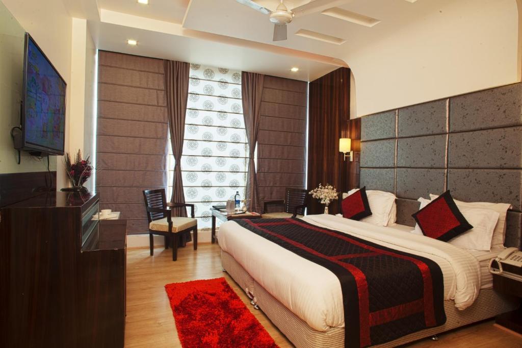 Hotel Delhi 55 -City Center New Delhi Værelse billede